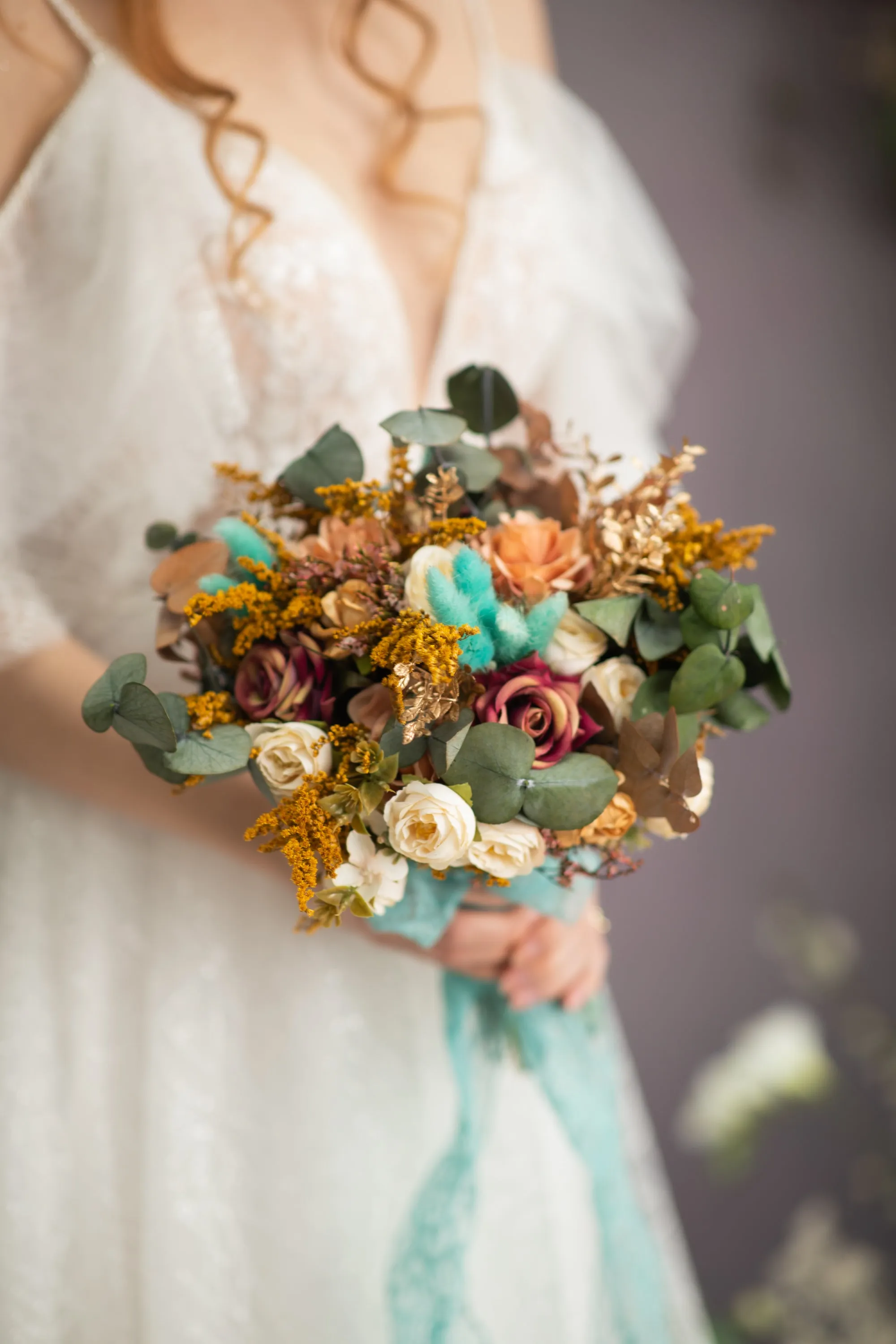 Autumn wedding bouquet with roses