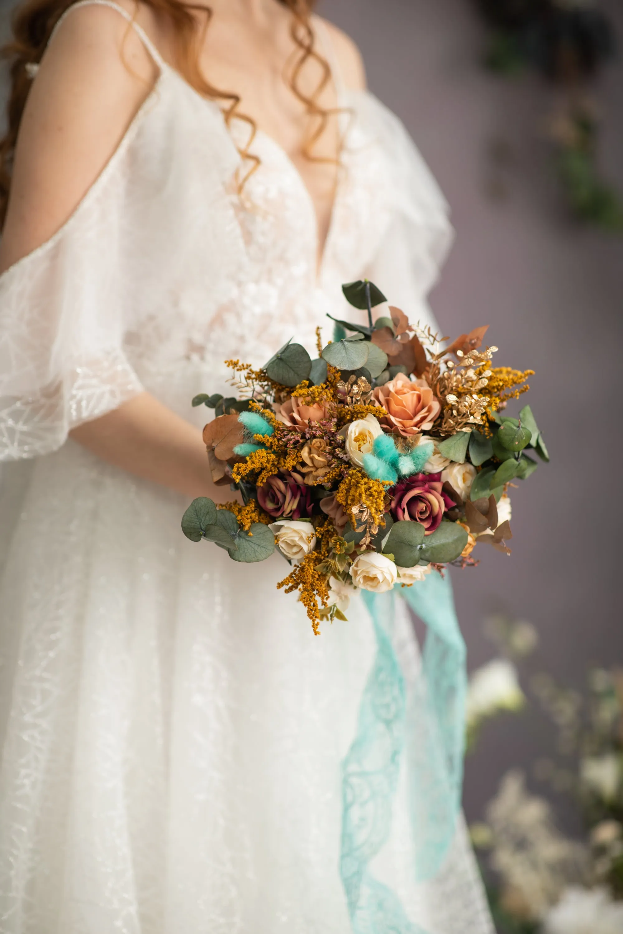 Autumn wedding bouquet with roses