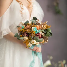 Autumn wedding bouquet with roses