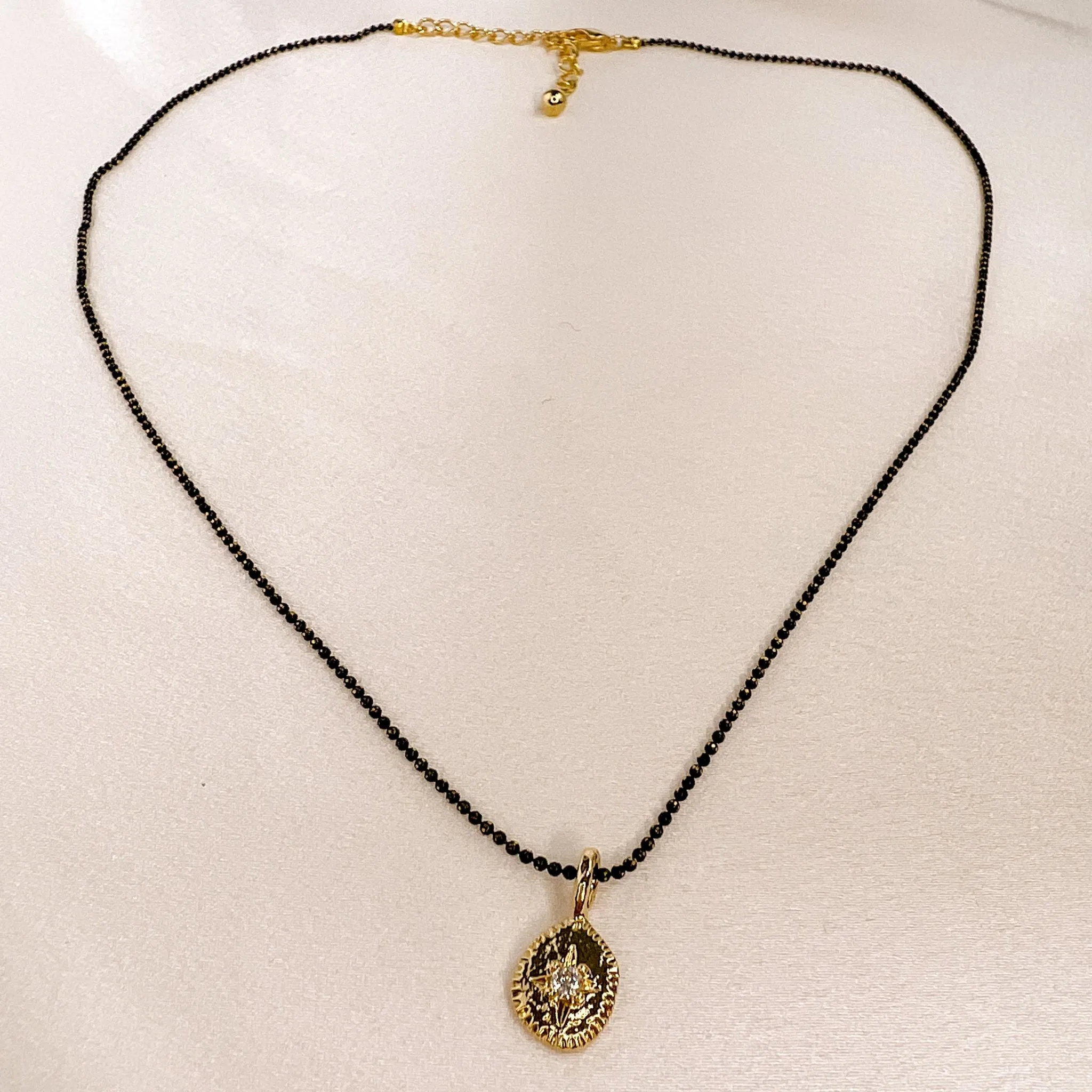 Starbrite Necklace in Black and Gold